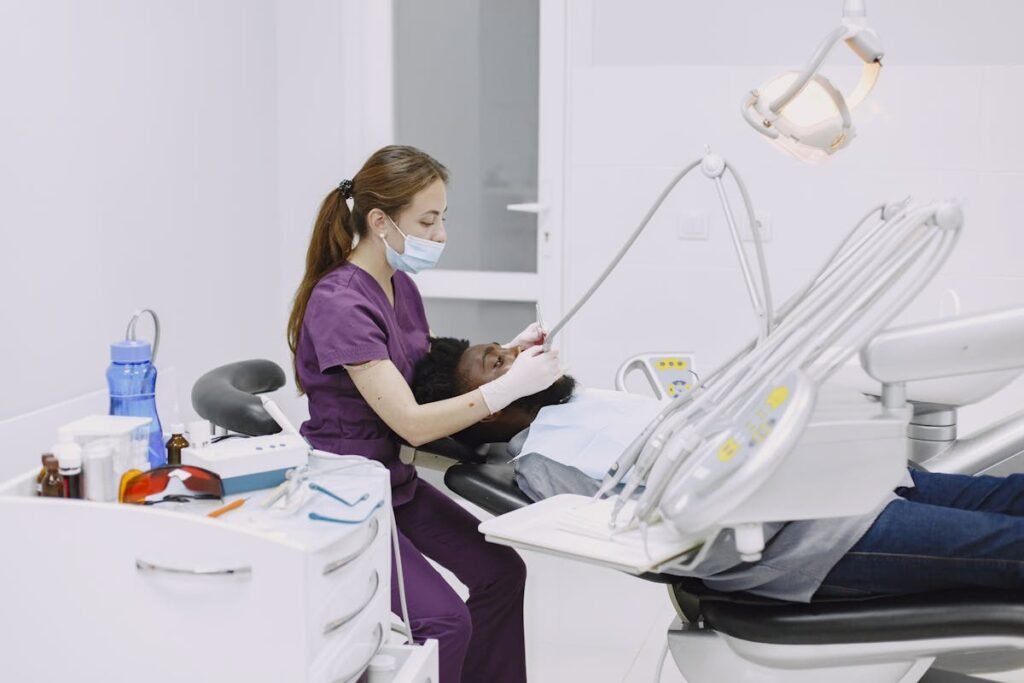 Professional dentist performing checkup in modern dental clinic